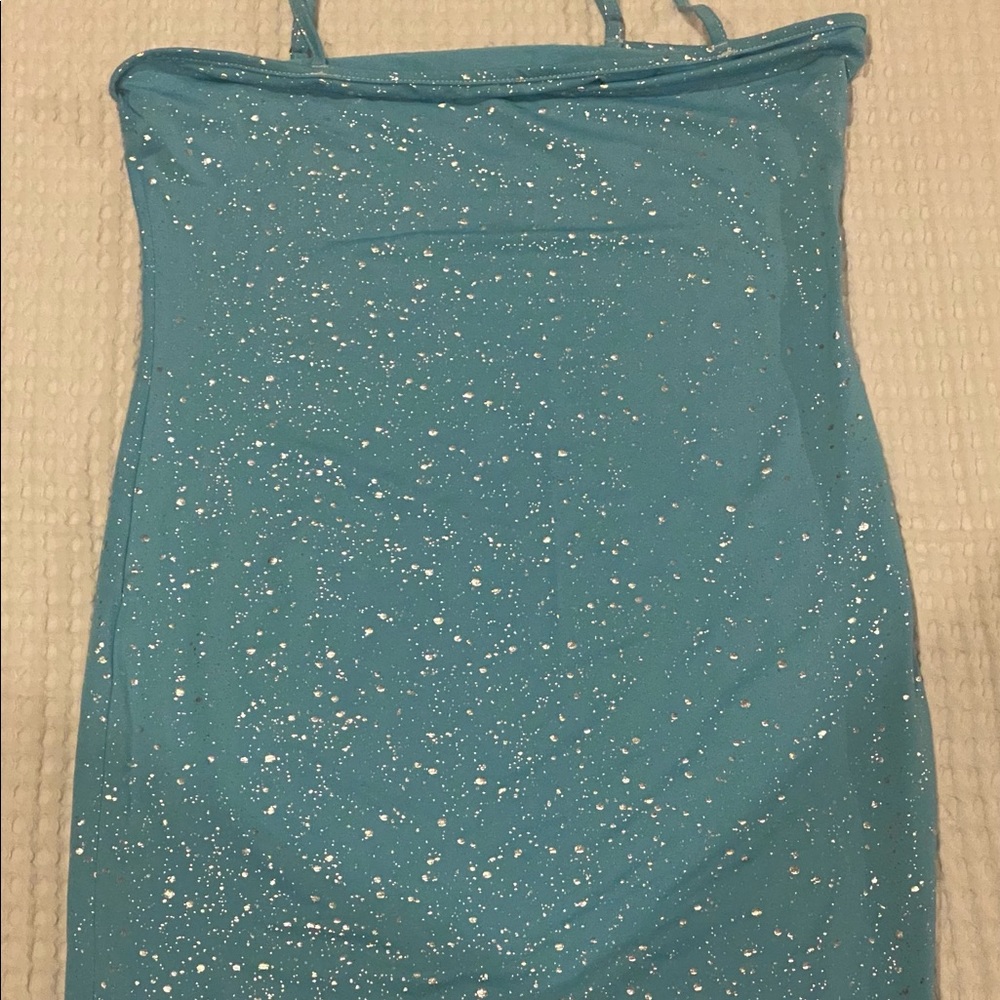 Brand new never worn sexy turquoise blue dress w/splats of silver all over 🤗
